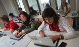 Gawa and grade 9 working in Global Studies class at BBIS in Berlin, Germany