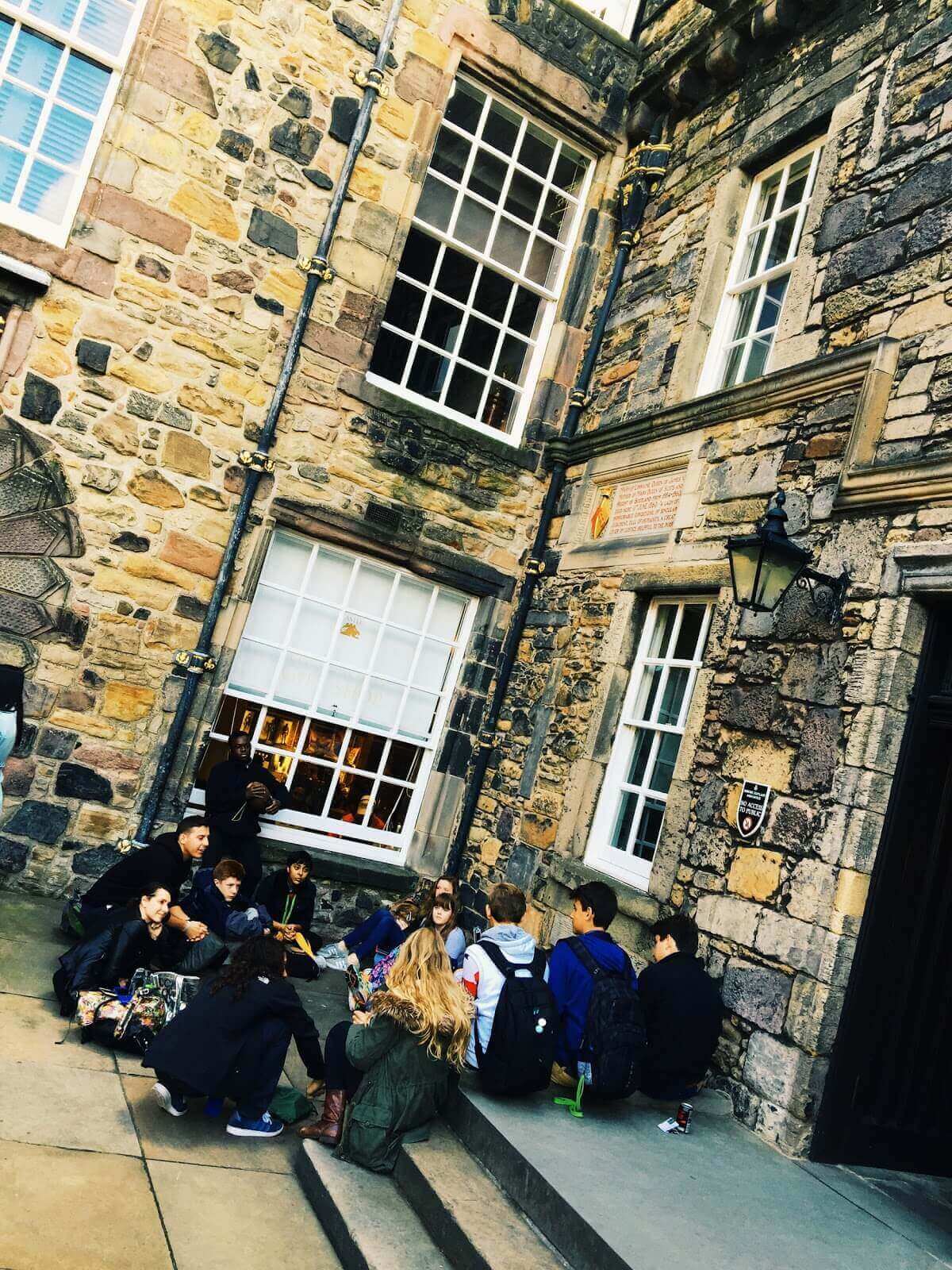 Nick and the Grade 10s lecture on Edinburgh Castle's grounds