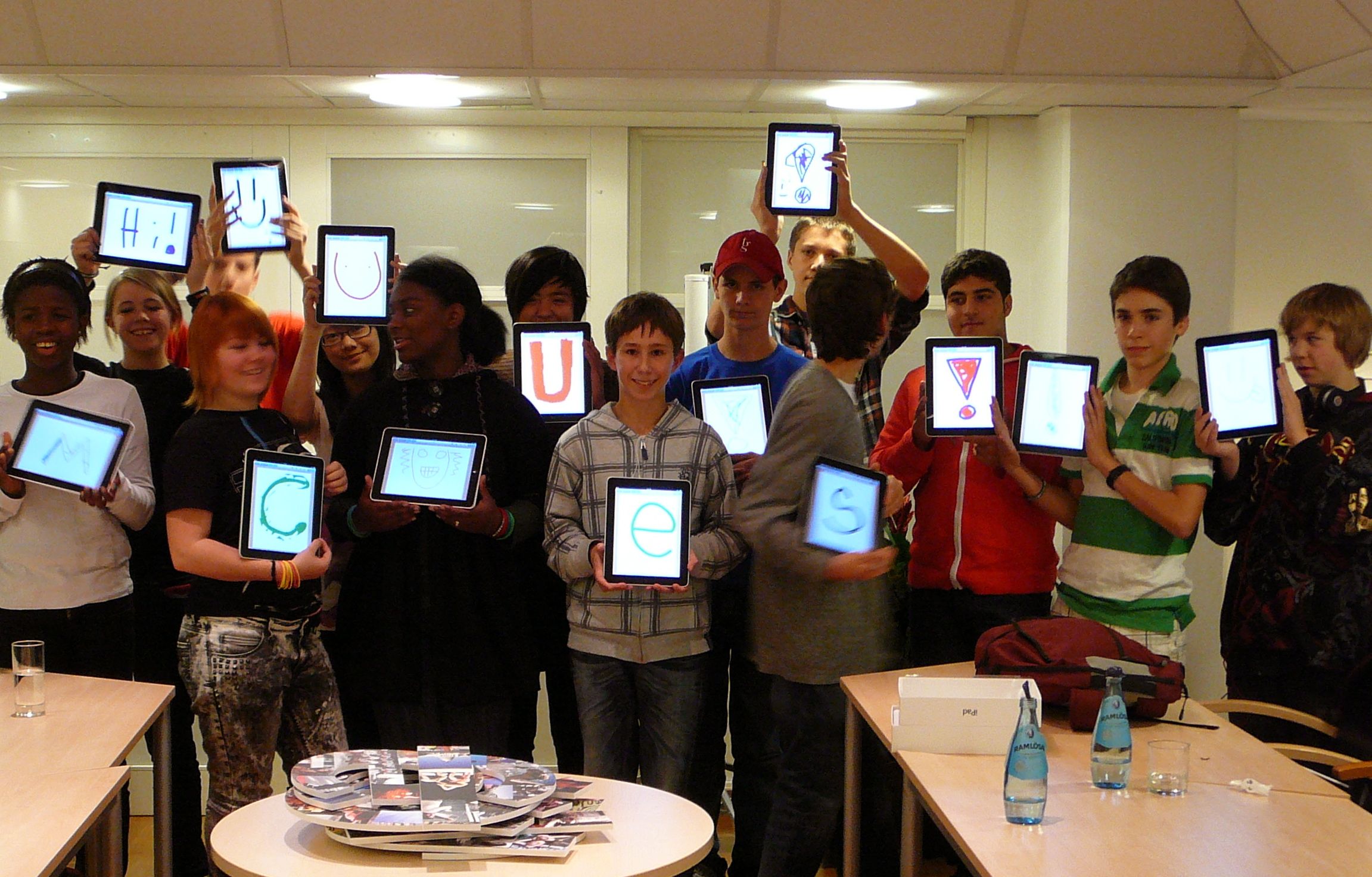 THINK Global School students show their iPads