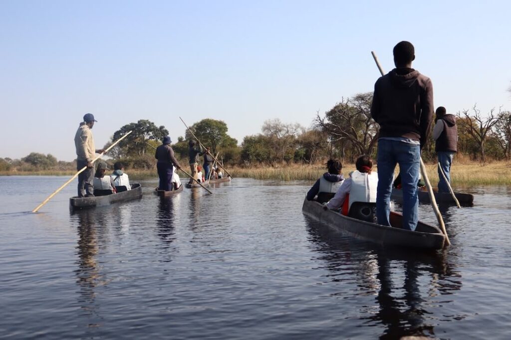 Students explore the Okavango Delta aboard mokoros