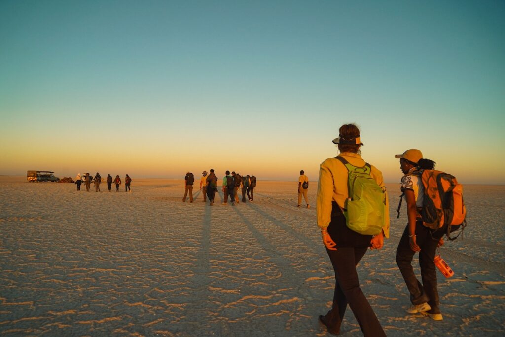 New students take part in a 10 kilometer hike to cap off their rite of passage